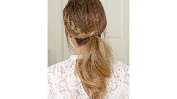 Half up half down low ponytail with a scarf