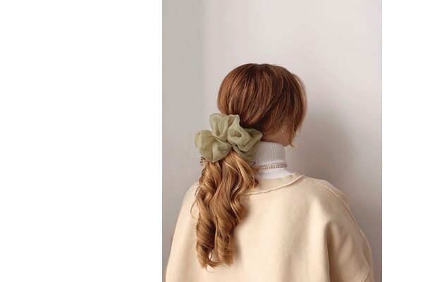 Half up half down low ponytail with a scarf