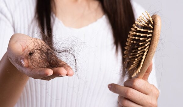5 Reasons You Notice More Hair On Your Brush In Winter — And Ways To Deal With The Hair Fall