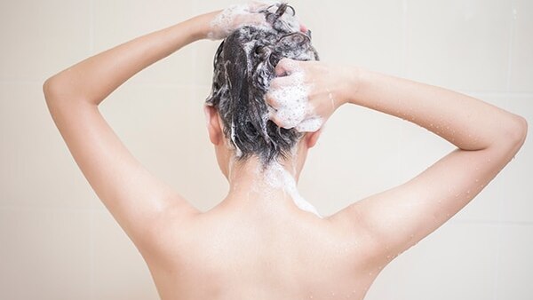 Everything you need to know about washing your hair after colouring it