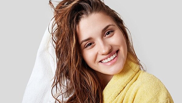 Everything you need to know about washing your hair after colouring it