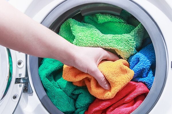 What is the best way to clean microfiber towels for hair?