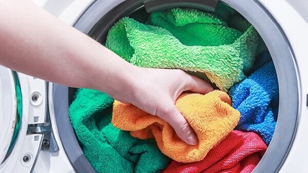 What is the best way to clean microfiber towels for hair?