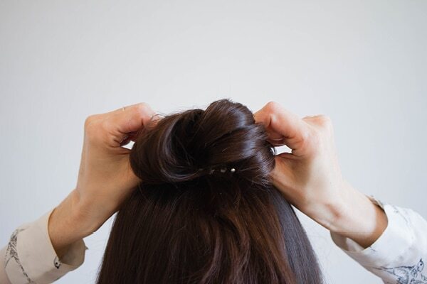 Half bun hairstyle hack: How to cover the bare spots?