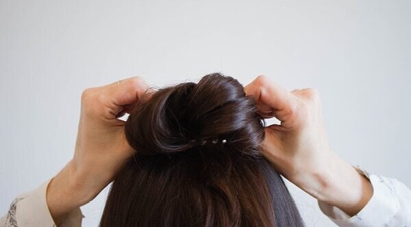 Half bun hairstyle hack: How to cover the bare spots?