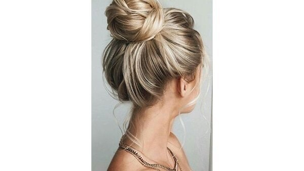 bun hairstyle Bejeweled updos for brides brown hair