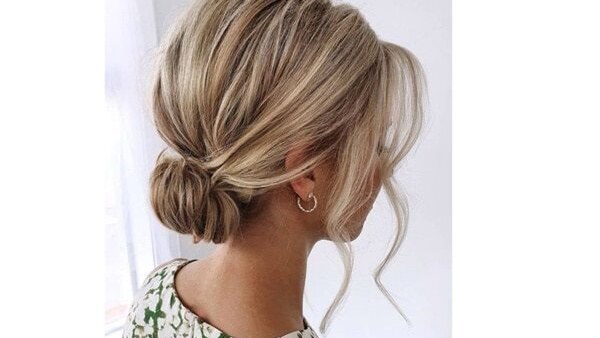 bun hairstyle Bejeweled updos for brides brown hair