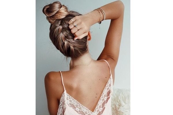 bun hairstyle Bejeweled updos for brides brown hair