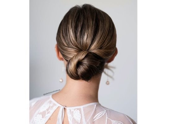 bun hairstyle Bejeweled updos for brides brown hair