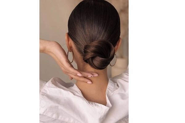 bun hairstyle Bejeweled updos for brides brown hair