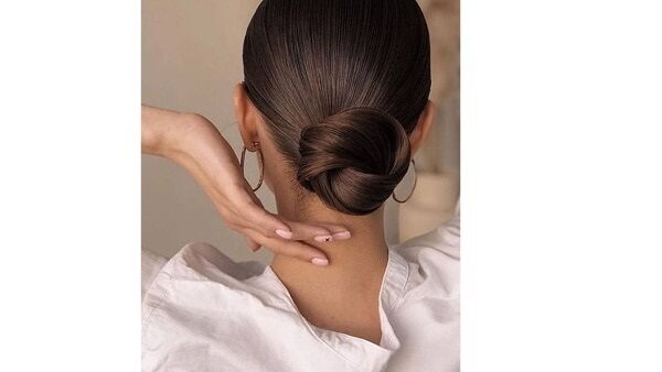 bun hairstyle Bejeweled updos for brides brown hair
