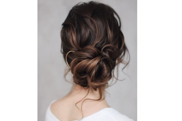 bun hairstyle Bejeweled updos for brides brown hair