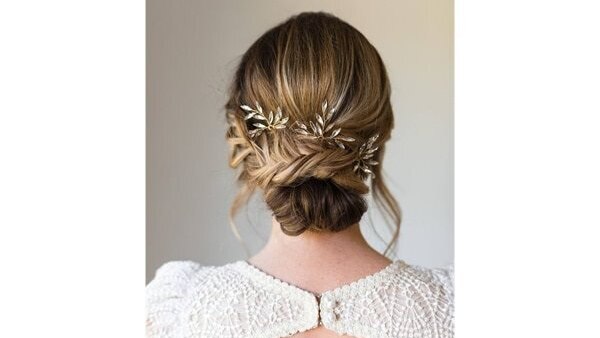 bun hairstyle Bejeweled updos for brides brown hair