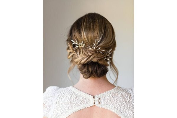 bun hairstyle Bejeweled updos for brides brown hair