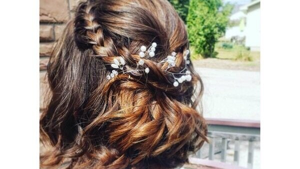3. Messy top-knot hairstyle