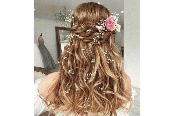 3. Messy top-knot hairstyle