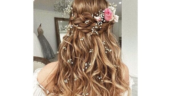 3. Messy top-knot hairstyle
