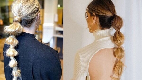 3. Messy top-knot hairstyle
