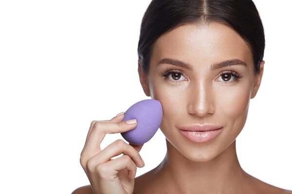 Use a makeup sponge for an airbrushed finish