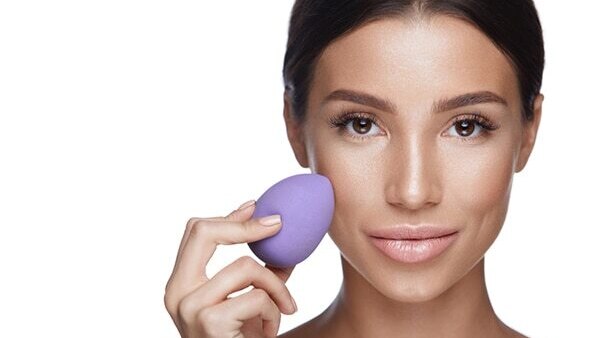 Use a makeup sponge for an airbrushed finish