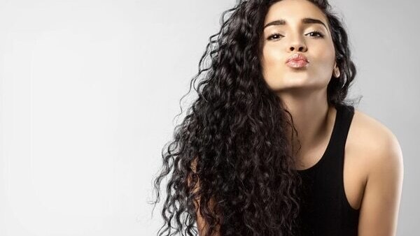 Brushing after curling