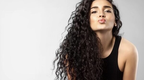 Brushing after curling