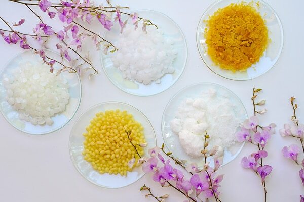 Why is candelilla wax added to cosmetics?