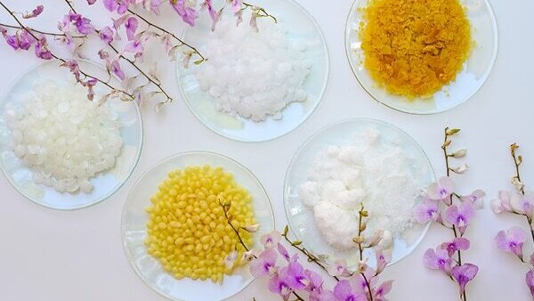 Why is candelilla wax added to cosmetics?