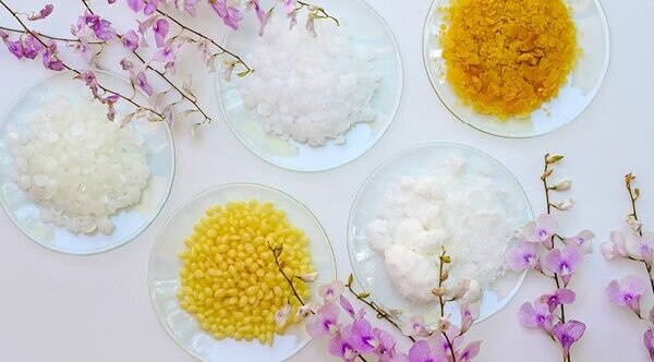 Why is candelilla wax added to cosmetics?