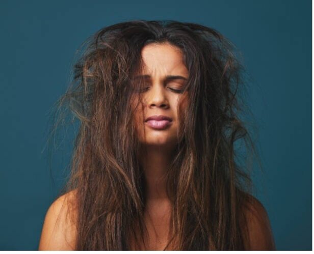 3. Curd + curry leaves hair mask