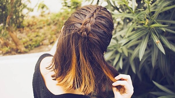 Sleek twisted half-up hairstyle