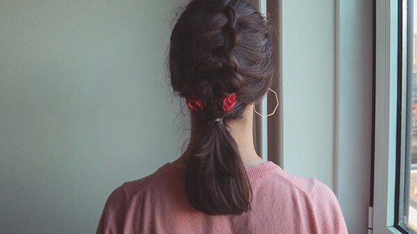Sleek twisted half-up hairstyle
