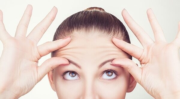 Pull your fingers towards your ear