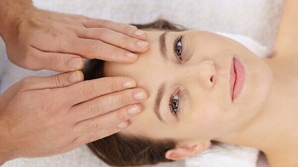 Pull your fingers towards your ear