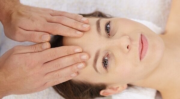 Pull your fingers towards your ear