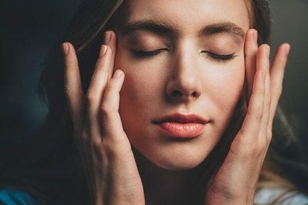 Pull your fingers towards your ear
