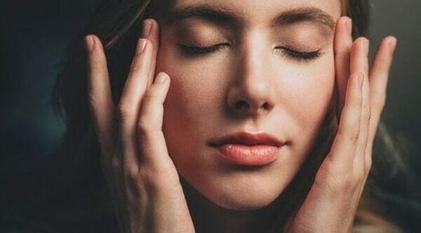 Pull your fingers towards your ear