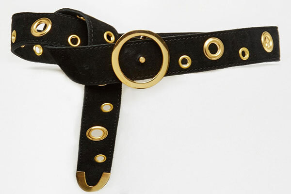 A black and gold suede or leather belt image