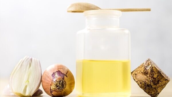Massage with garlic and coconut oil