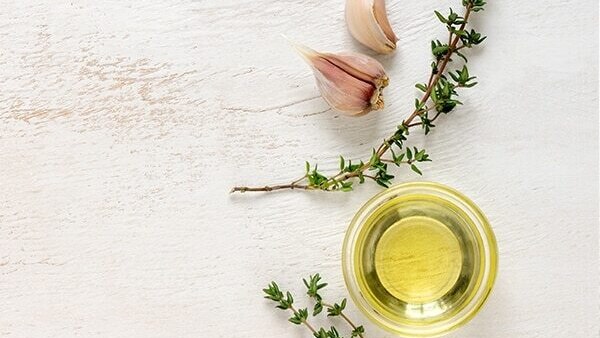 Massage with garlic and coconut oil