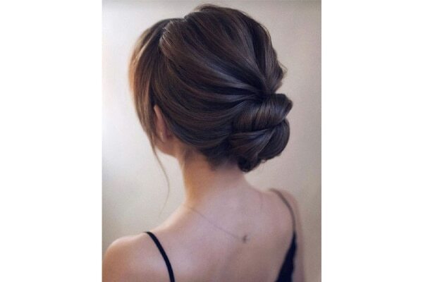 Create this super chic low bun
