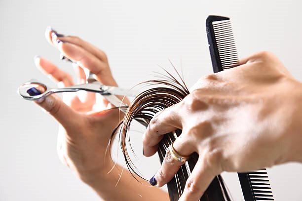 cutting hair at home blonde bangs