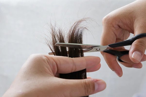 cutting hair at home blonde bangs