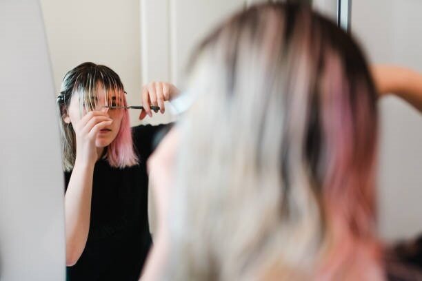 cutting hair at home blonde bangs