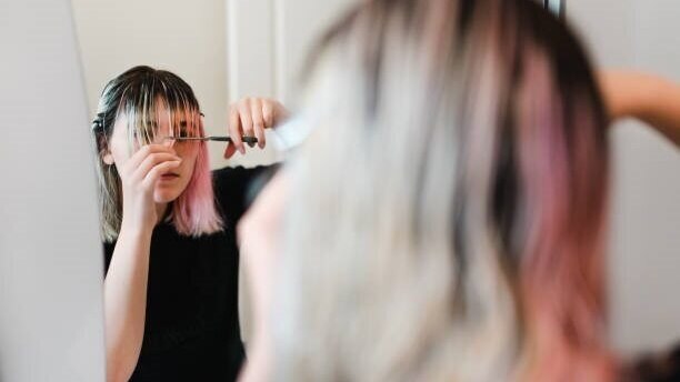 cutting hair at home blonde bangs