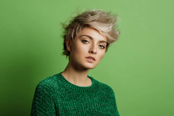 wolf cut hairstyle blonde wavy hair woman