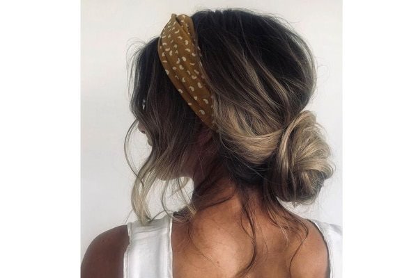 bun hairstyle Bejeweled updos for brides brown hair