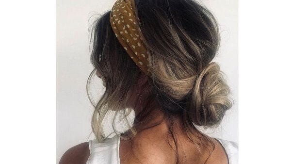 bun hairstyle Bejeweled updos for brides brown hair