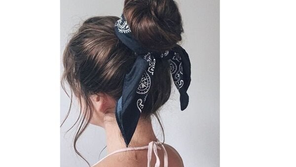 bun hairstyle Bejeweled updos for brides brown hair