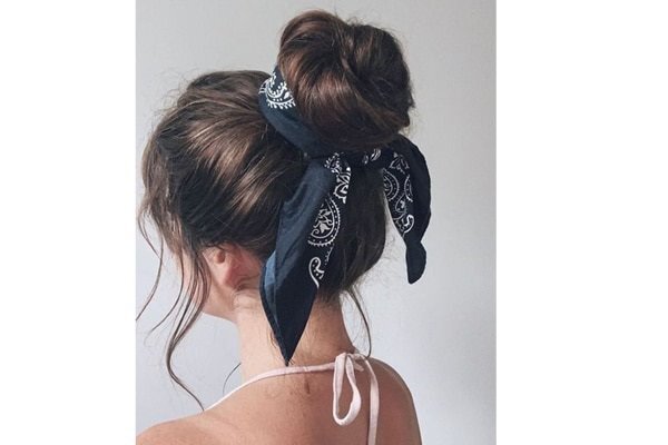bun hairstyle Bejeweled updos for brides brown hair